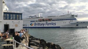 The Brittany Ferries ship Saint-Malo passing the Still and West pub in Old Portsmouth